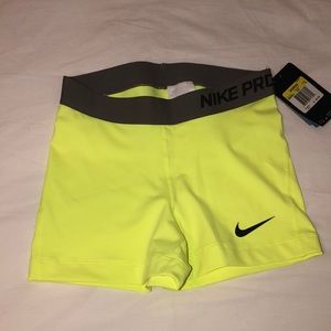 Brand new Nike pro shorts size small in neon